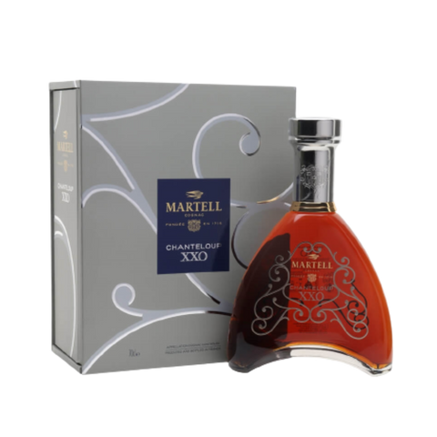 A bottle of Martell XXO Chanteloup Cognac with a decorative silver gift box.